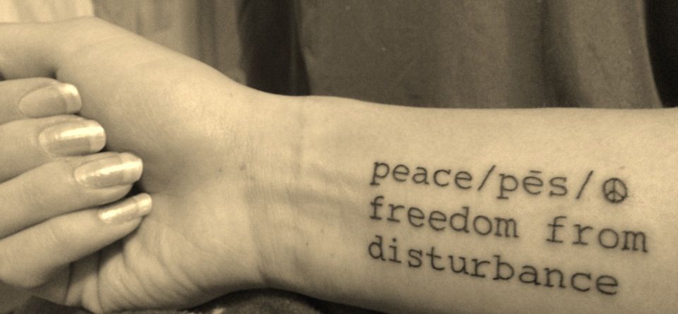arm peace tatoo